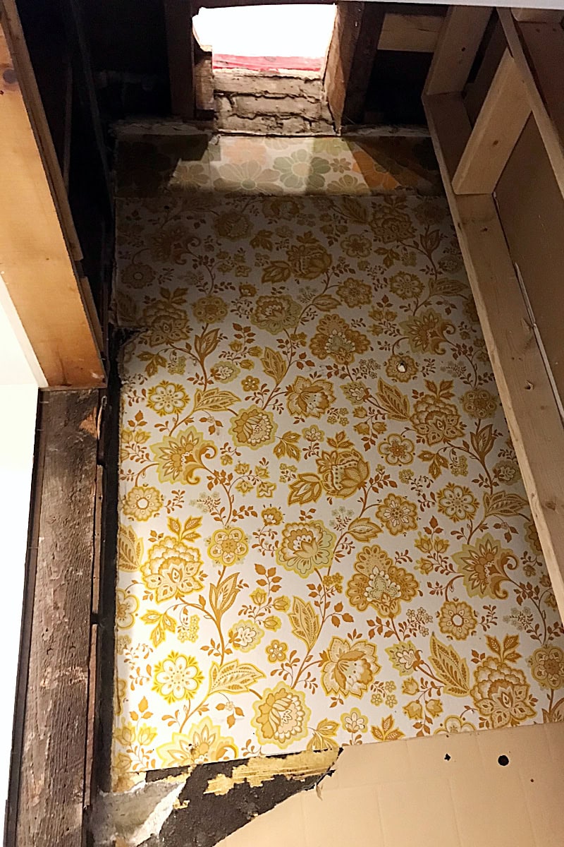 A view of the gap in the flooring from the floor beneath