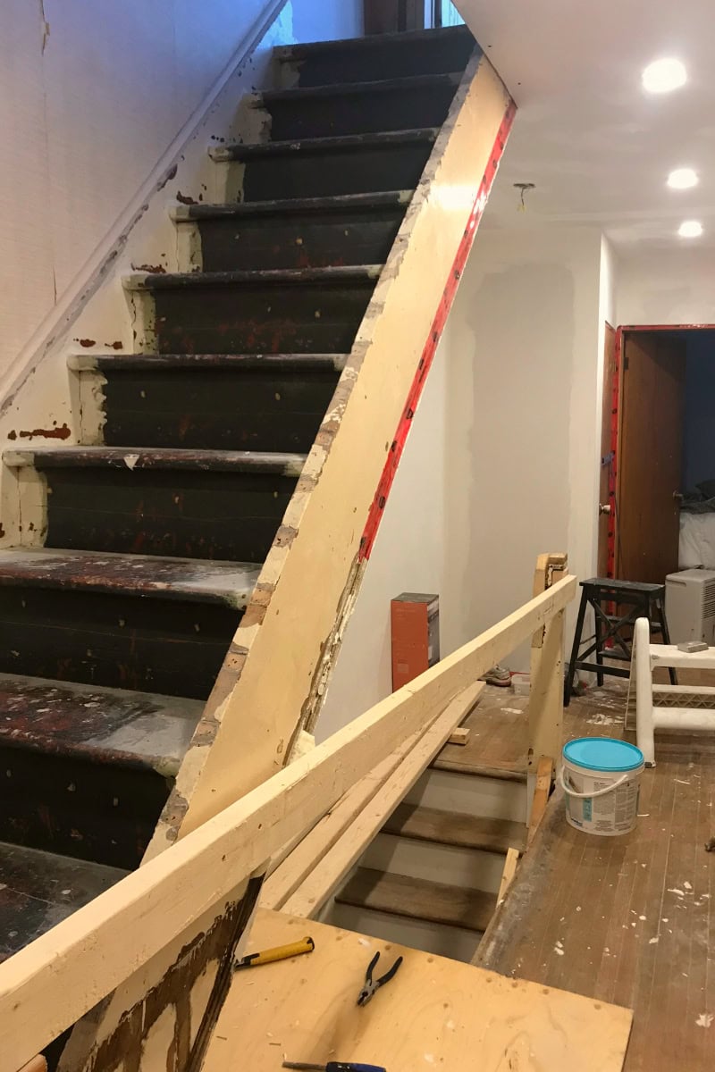 Staircase and hallway in the process of being renovated